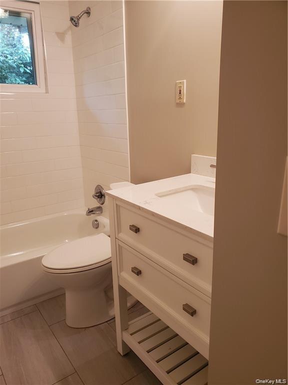 349 South Middletown Road Nanuet, NY 10954 - Photo 8 of 9 a bathroom with a toilet a sink and bathtub