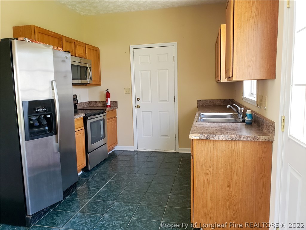 3809 Wildflower Road Hope Mills, NC 28348 - Photo 3 of 13 Gallery Image 3