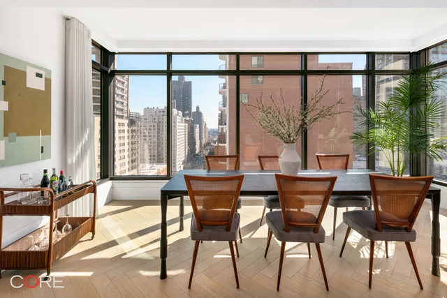a kitchen with a stove a sink and a refrigerator