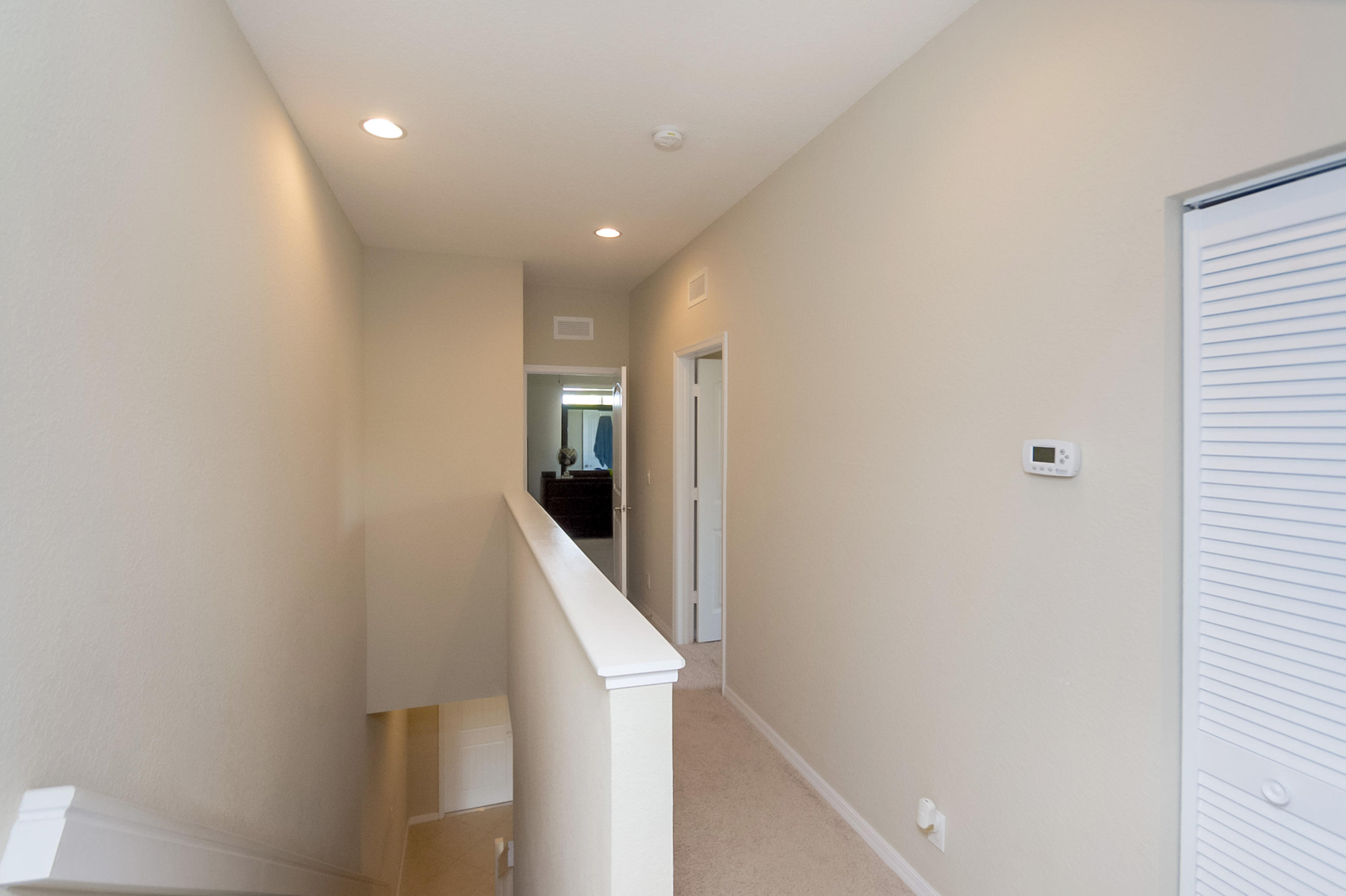 2622 Webb Avenue Delray Beach, FL 33444 - Photo 12 of 16 a view of hallway with washer and dryer
