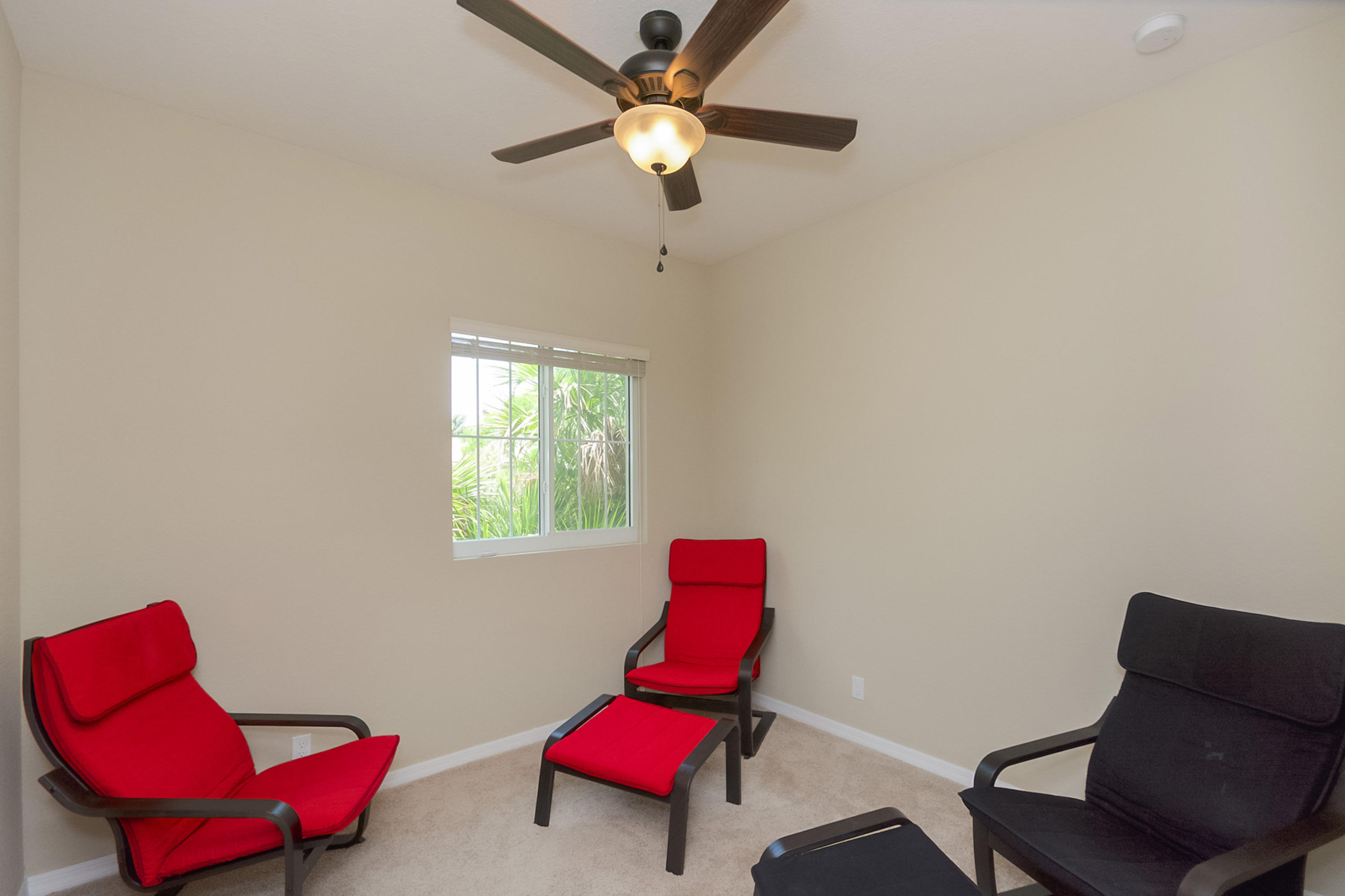 2622 Webb Avenue Delray Beach, FL 33444 - Photo 9 of 16 a living room with furniture and a fan