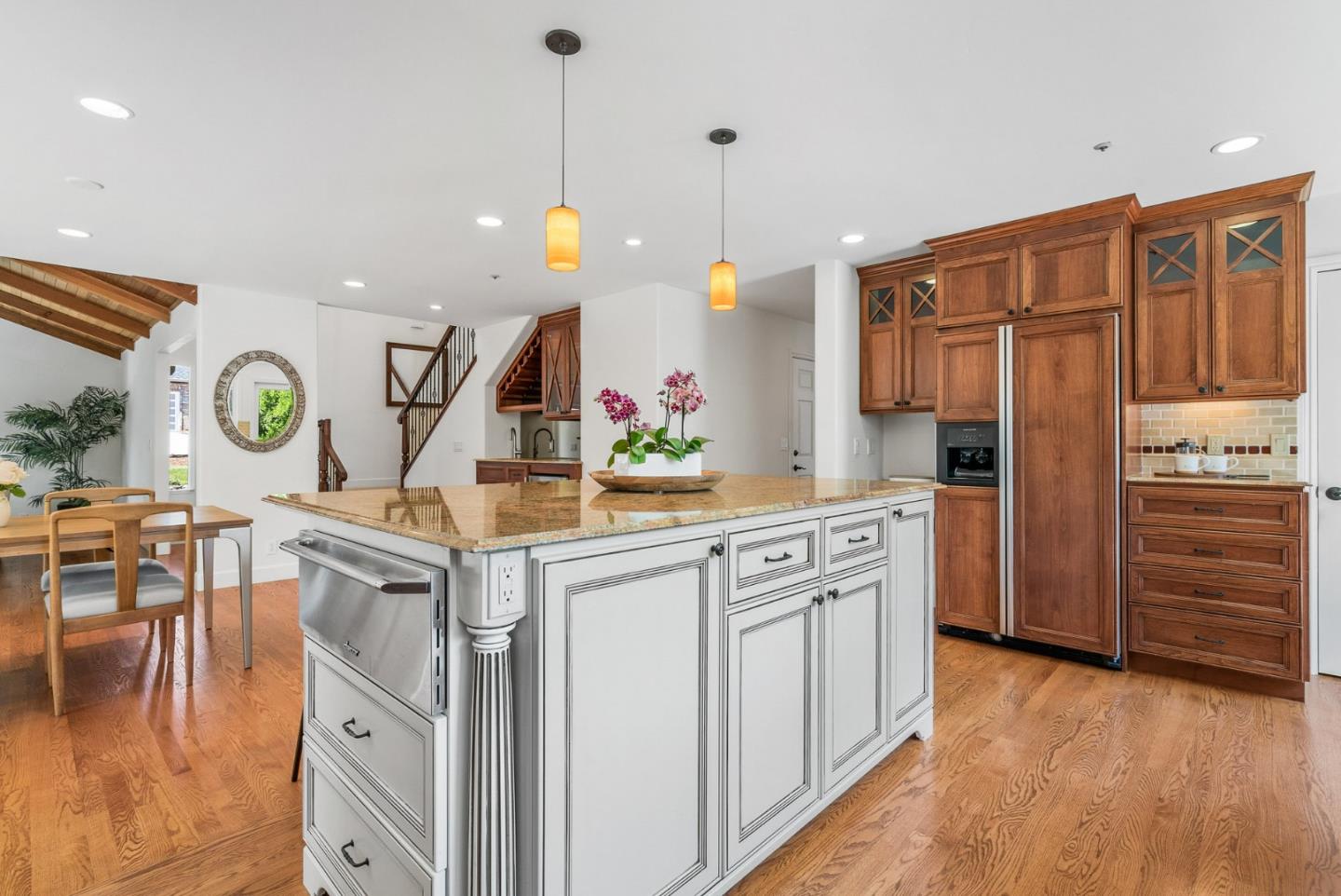 144 Victoria Lane Aptos, CA 95003 - Photo 13 of 36 a kitchen with white cabinets and stainless steel appliances