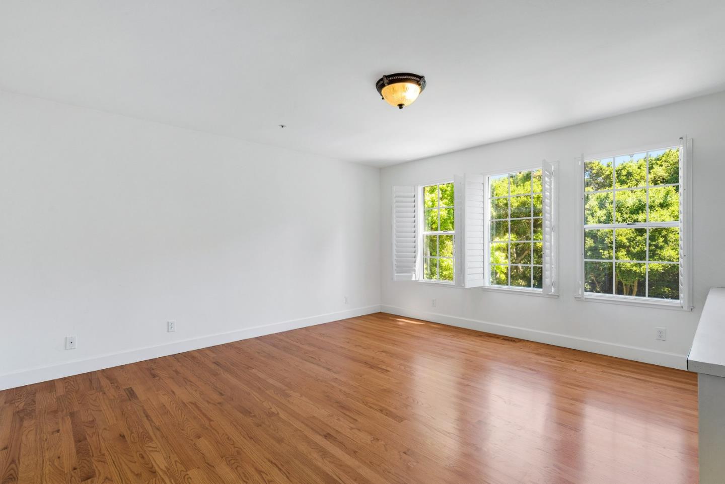 144 Victoria Lane Aptos, CA 95003 - Photo 16 of 36 a view of room with window and hardwood floor