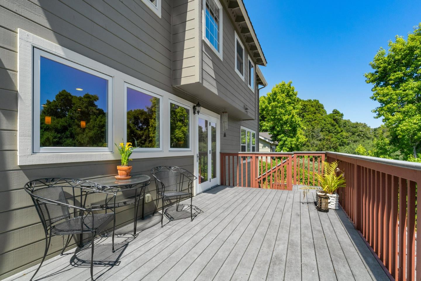 144 Victoria Lane Aptos, CA 95003 - Photo 27 of 36 a balcony with wooden floor table and chairs