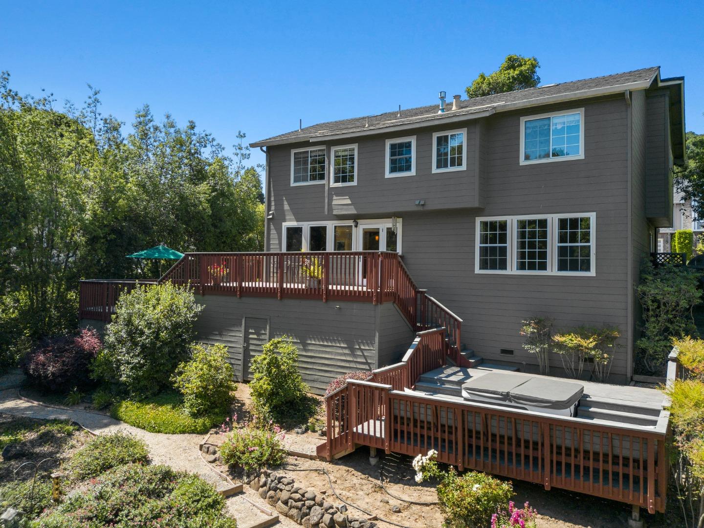 144 Victoria Lane Aptos, CA 95003 - Photo 29 of 36 a front view of a house with a yard