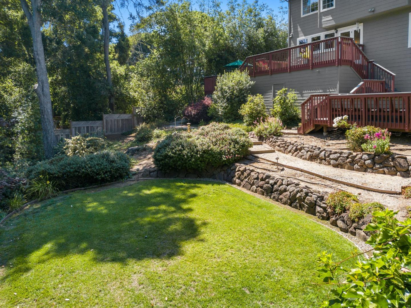 144 Victoria Lane Aptos, CA 95003 - Photo 30 of 36 a view of a backyard with plants