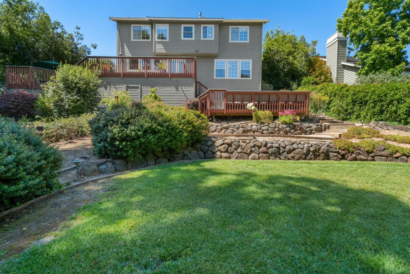 144 Victoria Lane Aptos, CA 95003 - Photo 32 of 36 a front view of a house with a yard