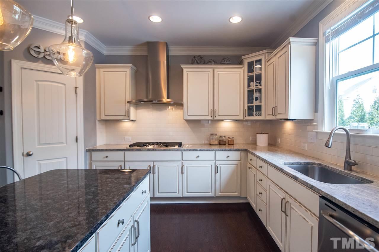2720 Country Charm Road Raleigh, NC 27614 - Photo 7 of 30 Chef's kitchen features gas range and stainless steel hood!