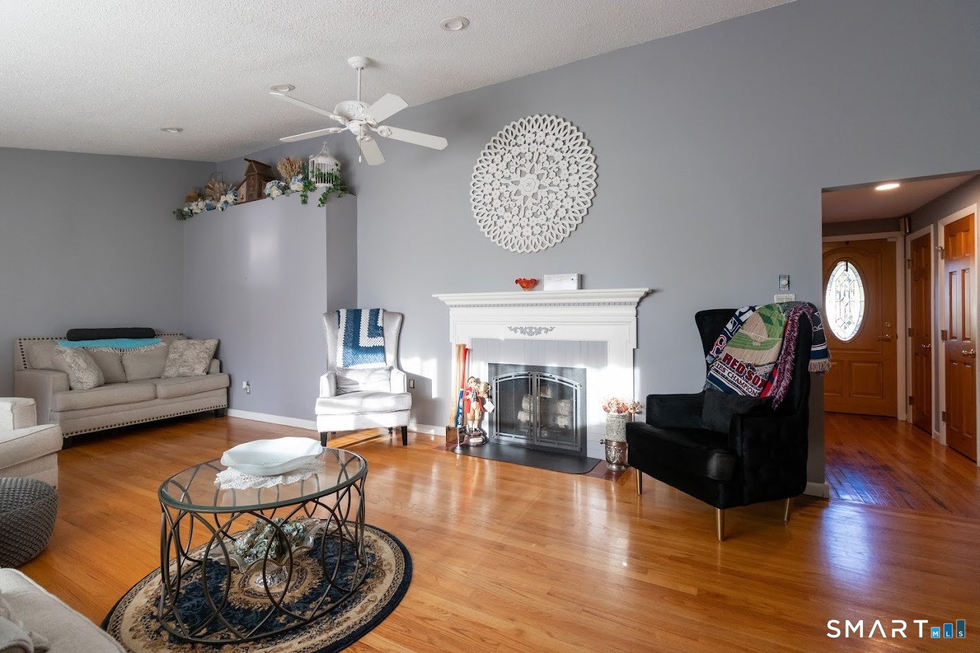 763 North Street Suffield, CT 06078 - Photo 21 of 40 a living room with furniture and a fireplace