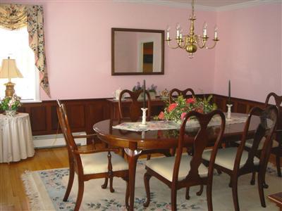 Undisclosed Address Marstons Mills, MA 02648 - Photo 5 of 10 a view of a dining room with furniture and chandelier