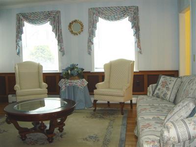 Undisclosed Address Marstons Mills, MA 02648 - Photo 6 of 10 a living room with furniture and a large window