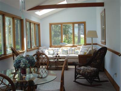 Undisclosed Address Marstons Mills, MA 02648 - Photo 8 of 10 a living room with furniture and a large window