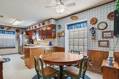 a view of a dining room with furniture