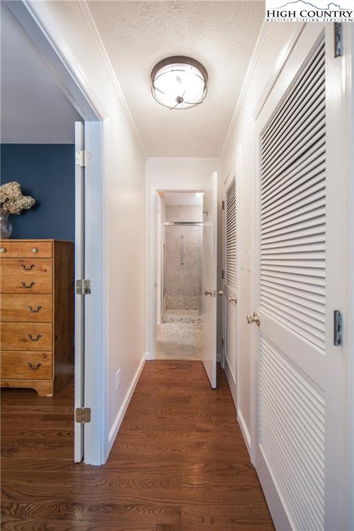 485 Chestnut Drive Boone, NC 28607 - Photo 15 of 48 a view of a hallway with wooden floor and closet