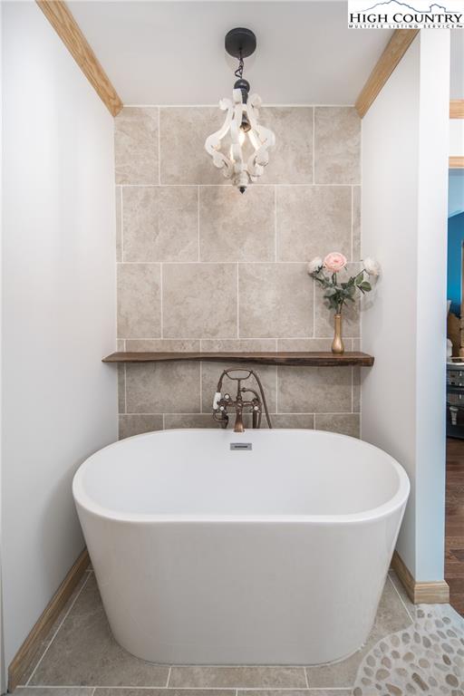 485 Chestnut Drive Boone, NC 28607 - Photo 18 of 48 a white bath tub sitting in a bathroom