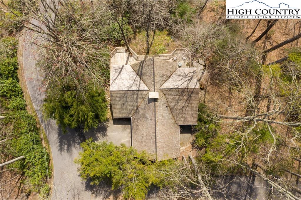 485 Chestnut Drive Boone, NC 28607 - Photo 2 of 48 a view of a pathway of a building