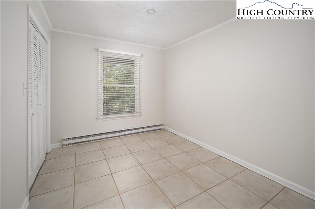 485 Chestnut Drive Boone, NC 28607 - Photo 34 of 48 a view of an empty room with a window