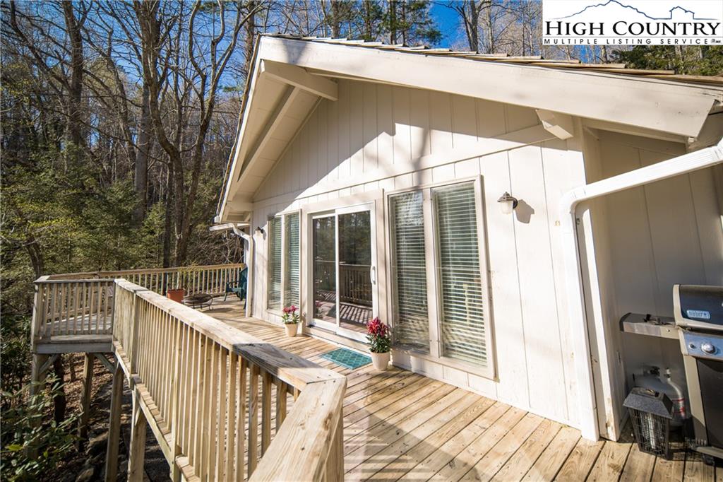 485 Chestnut Drive Boone, NC 28607 - Photo 39 of 48 a view of balcony with wooden floor and outdoor seating