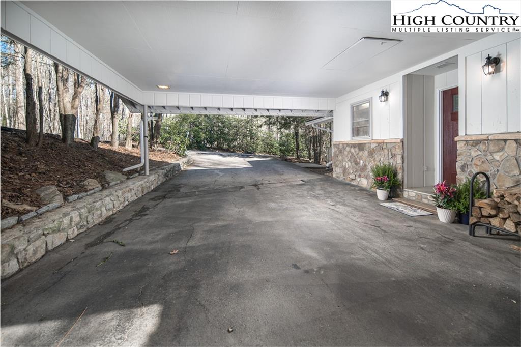485 Chestnut Drive Boone, NC 28607 - Photo 46 of 48 a view of a porch with wooden floor