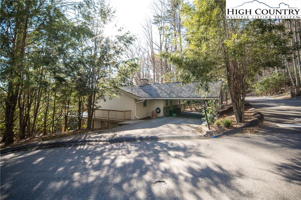 485 Chestnut Drive Boone, NC 28607 - Photo 47 of 48 a view of a house with a tree in front