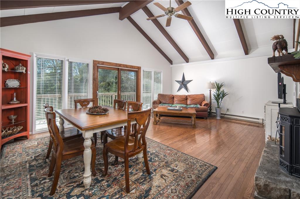 485 Chestnut Drive Boone, NC 28607 - Photo 8 of 48 a view of a dining room with furniture window and wooden floor