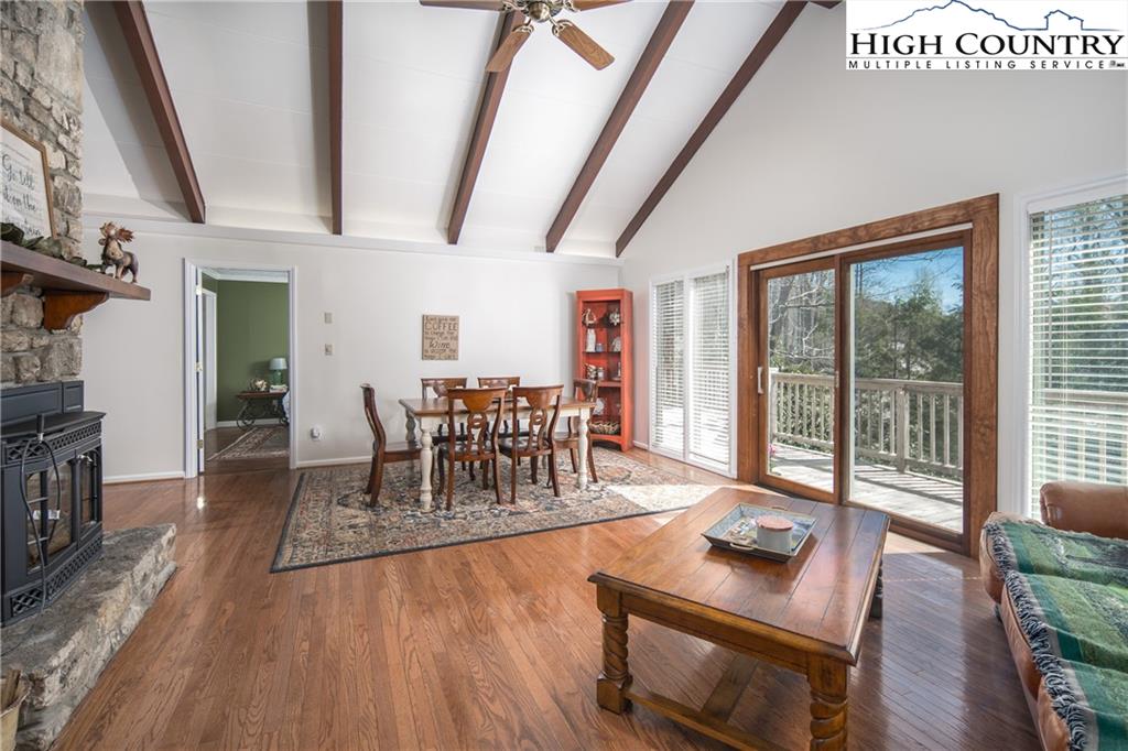 485 Chestnut Drive Boone, NC 28607 - Photo 10 of 48 a view of a dining room with furniture window and wooden floor