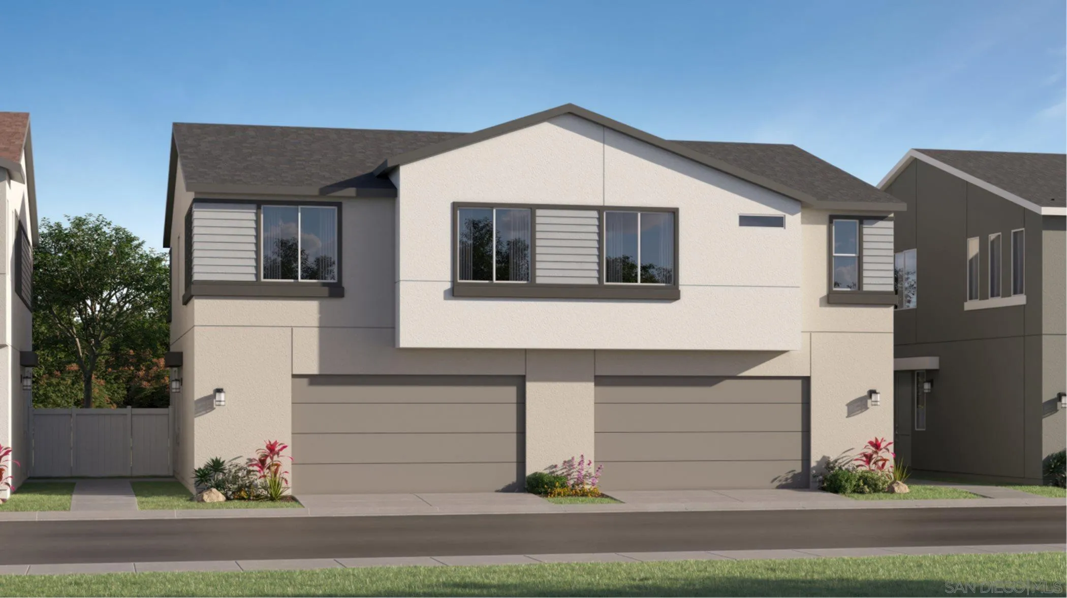 a front view of a house with garage