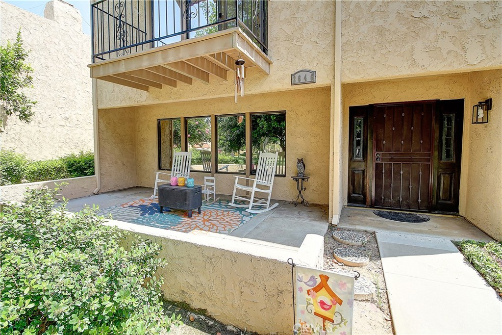 2646 Shamblin Court Riverside, CA 92504 - Photo 1 of 1 a building outdoor space with patio furniture and potted plants