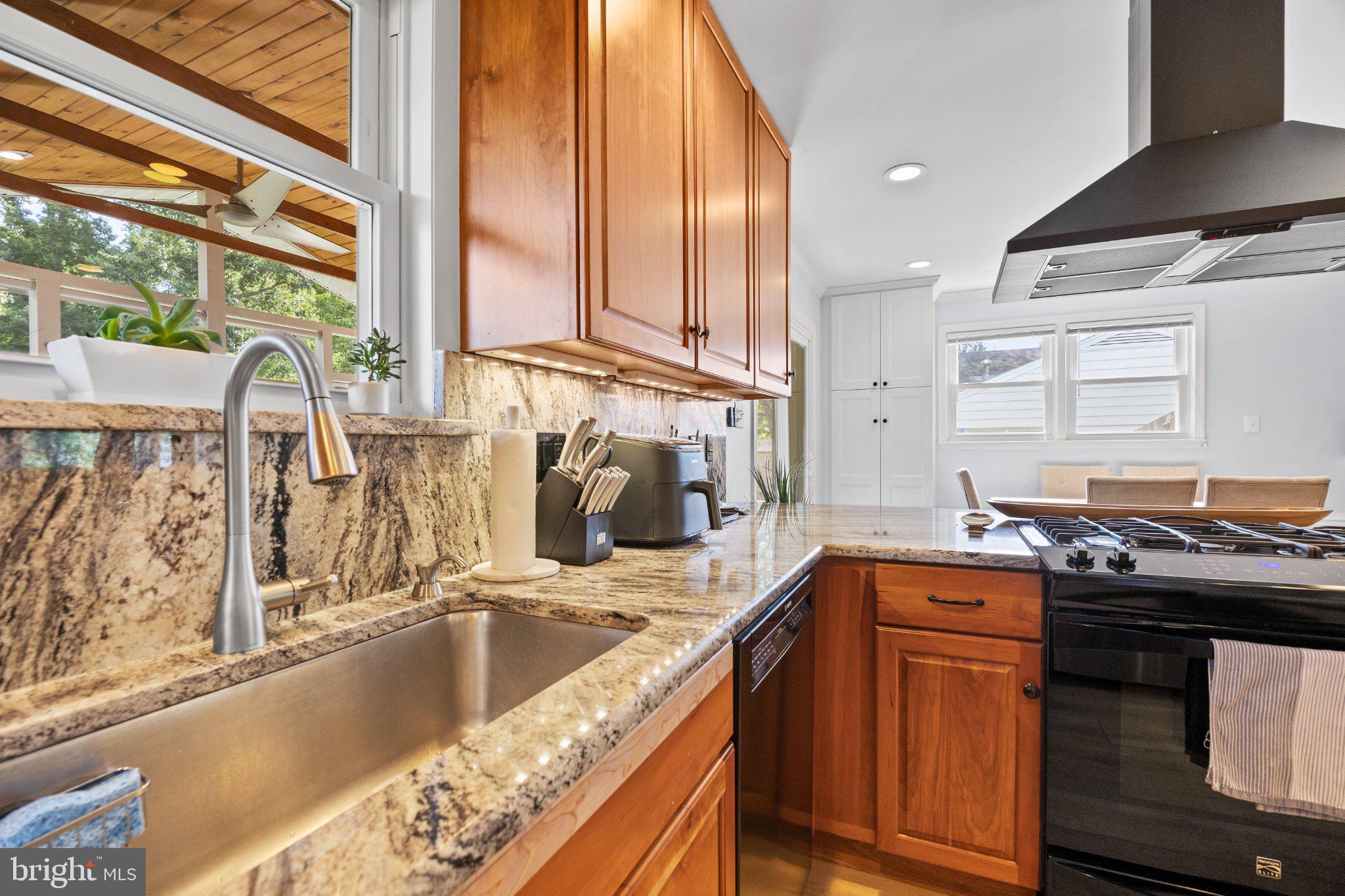 6705 New Hope Drive Springfield, VA 22151 - Photo 26 of 67 Modern kitchen with elegant finishes.