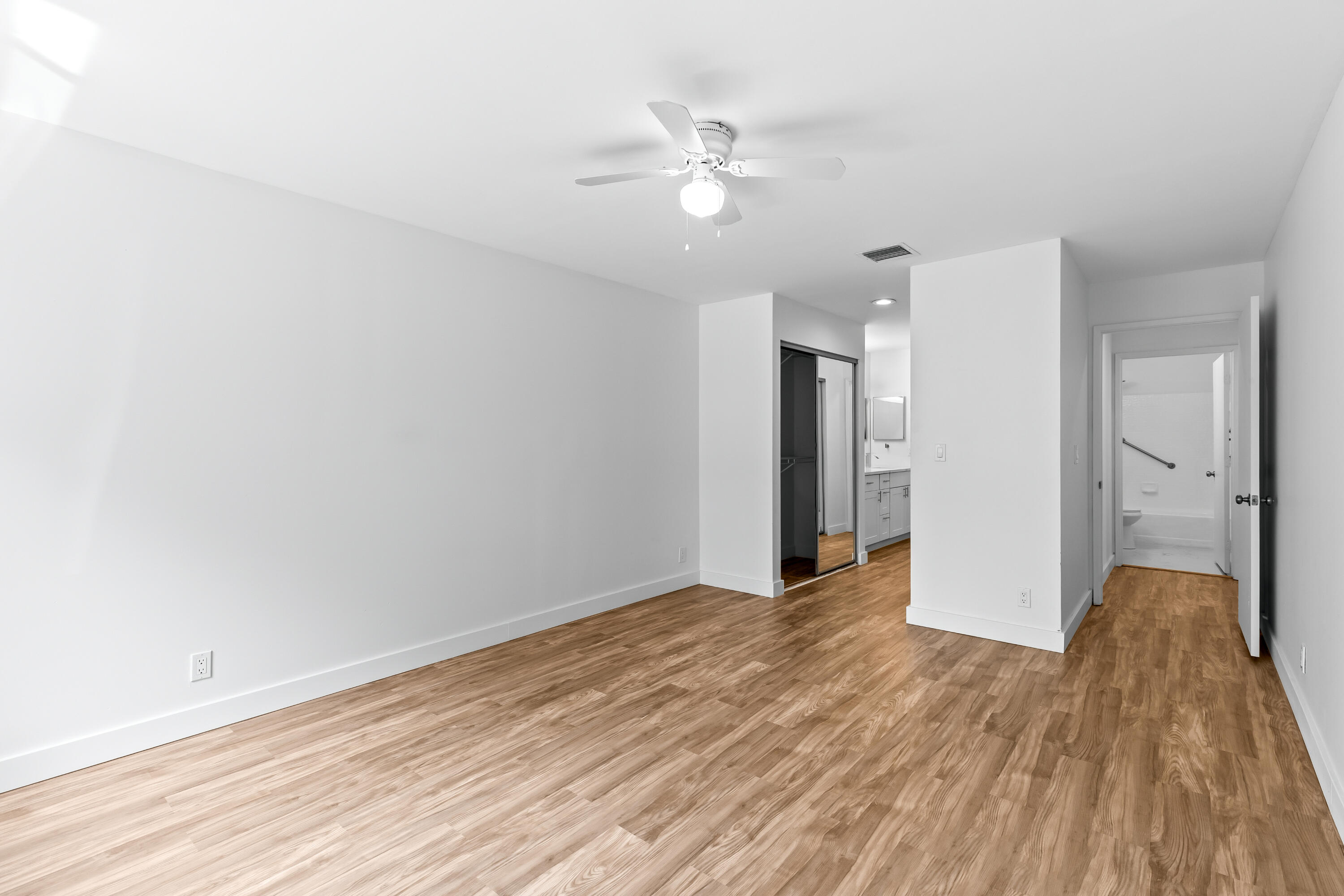 8089 Springtree Road Boca Raton, FL 33496 - Photo 13 of 35 a view of livingroom with wooden floor