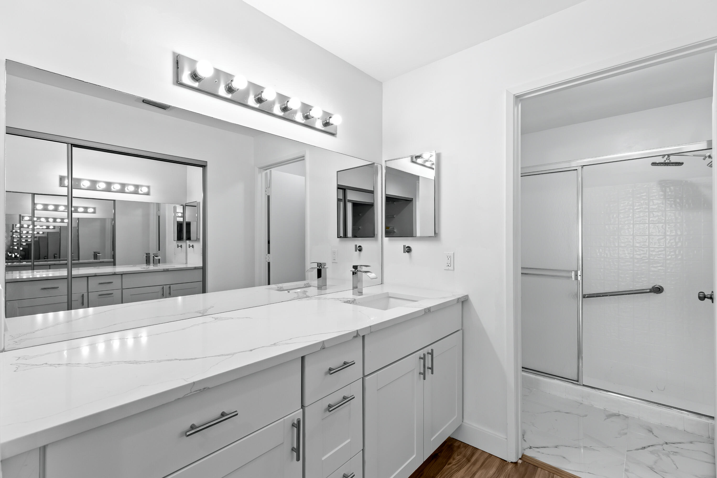 8089 Springtree Road Boca Raton, FL 33496 - Photo 15 of 35 a spacious bathroom with a shower sink and mirror