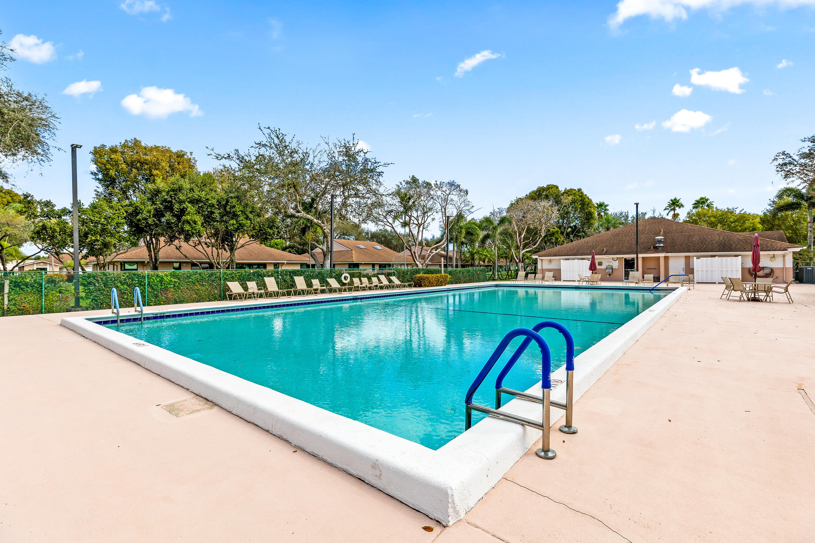 8089 Springtree Road Boca Raton, FL 33496 - Photo 26 of 35 a view of swimming pool with a yard and a fountain