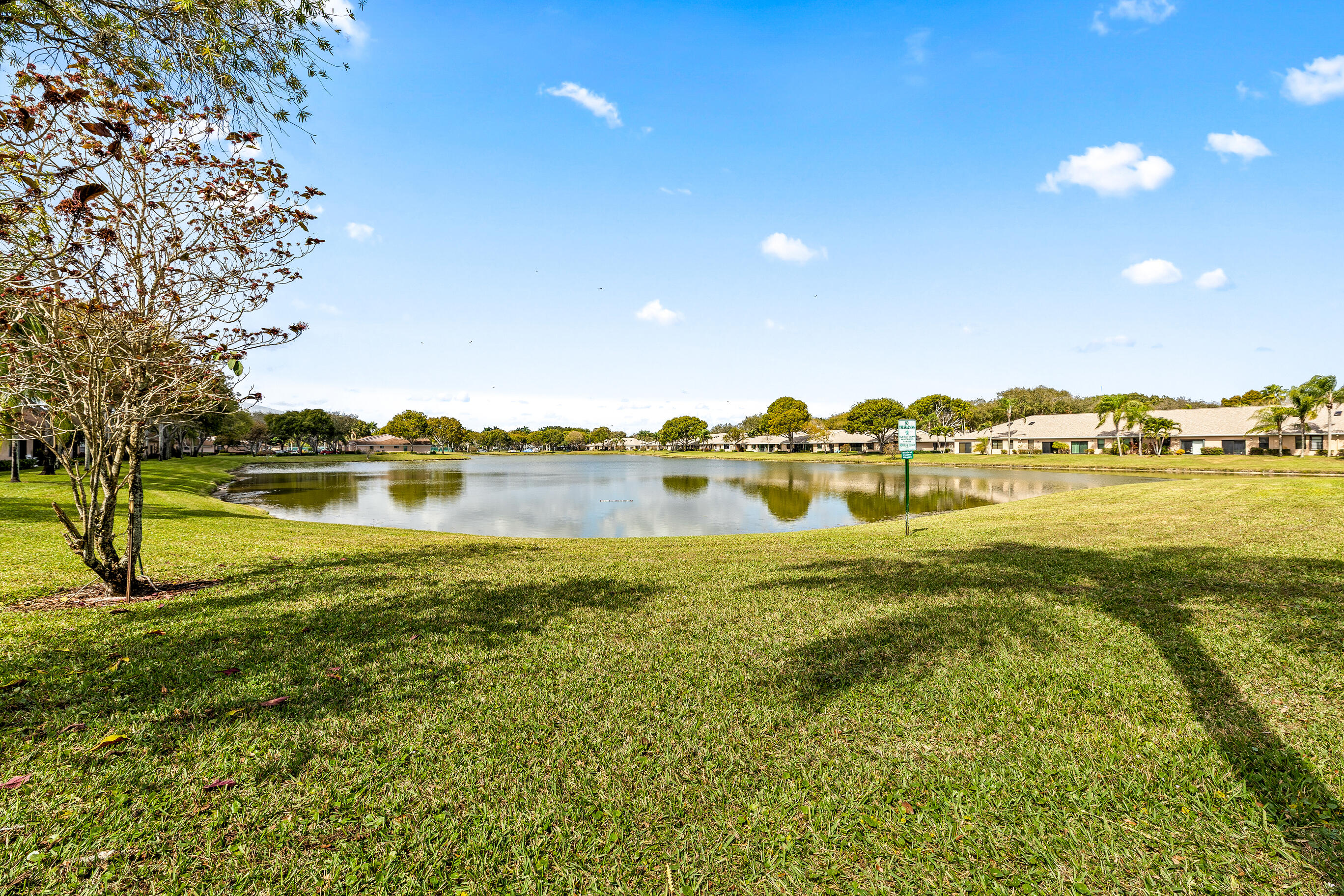 8089 Springtree Road Boca Raton, FL 33496 - Photo 35 of 35 a view of a lake with a big yard