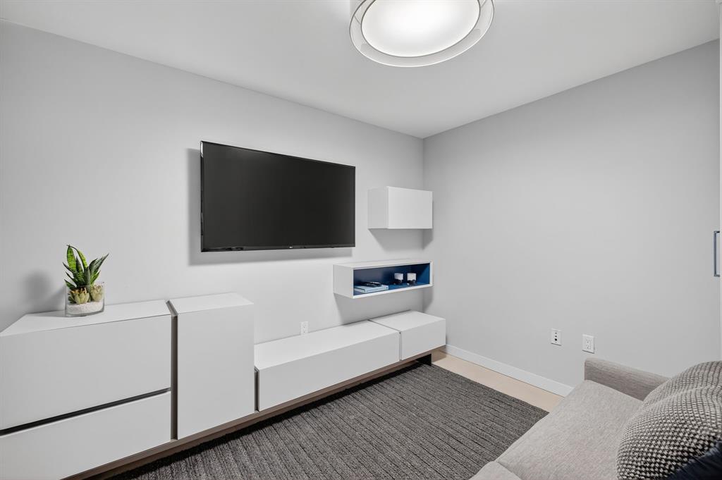 401 North Birch Road, Unit 1103 Fort Lauderdale, FL 33304 - Photo 18 of 45 a living room with furniture and a flat screen tv