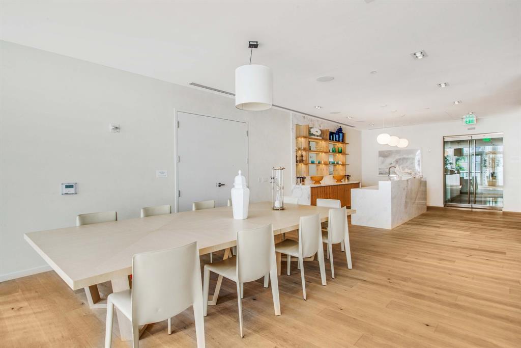 401 North Birch Road, Unit 1103 Fort Lauderdale, FL 33304 - Photo 40 of 45 a dining room with furniture and wooden floor