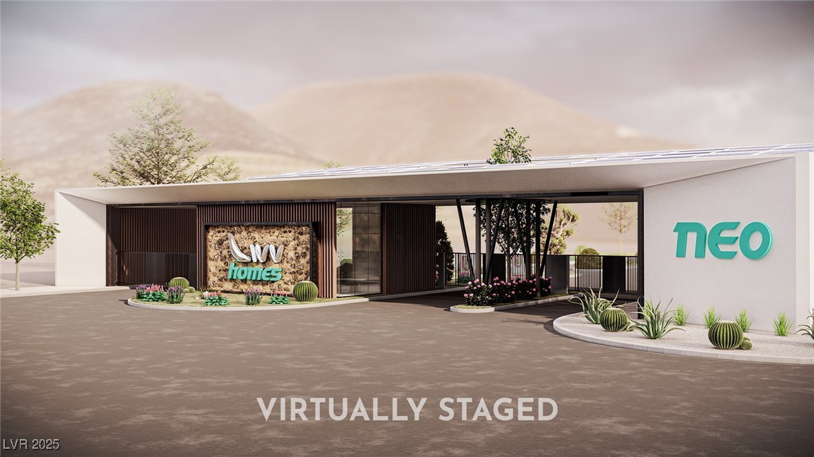 405 Net Zero Drive Henderson, NV 89012 - Photo 18 of 22 Guard gate entrance