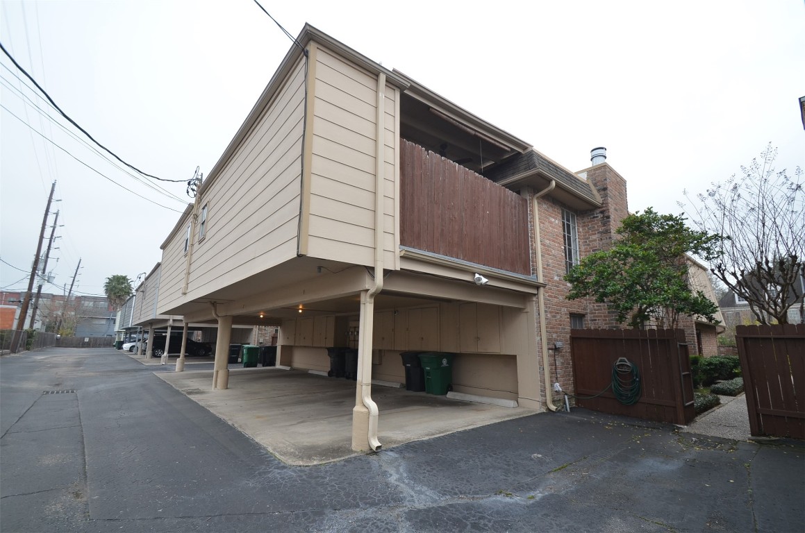 5524 Beverly Hill Street, Unit 2 Houston, TX 77056 - Photo 33 of 43 a house view with a outdoor space