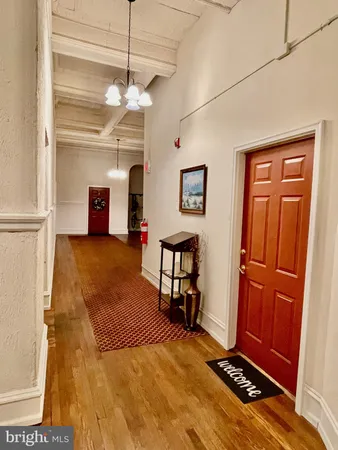 a living room with furniture fireplace and a flat screen tv