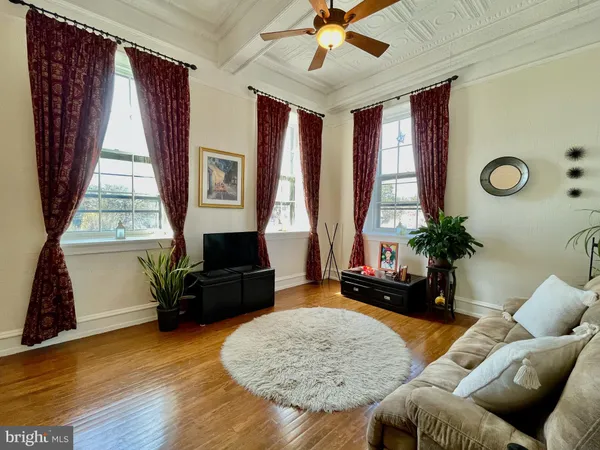 a bathroom with a sink a mirror and a shower