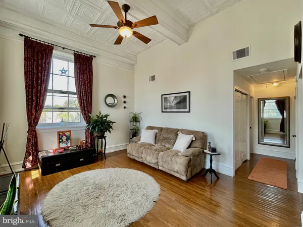 a bedroom with a bed and a table in it