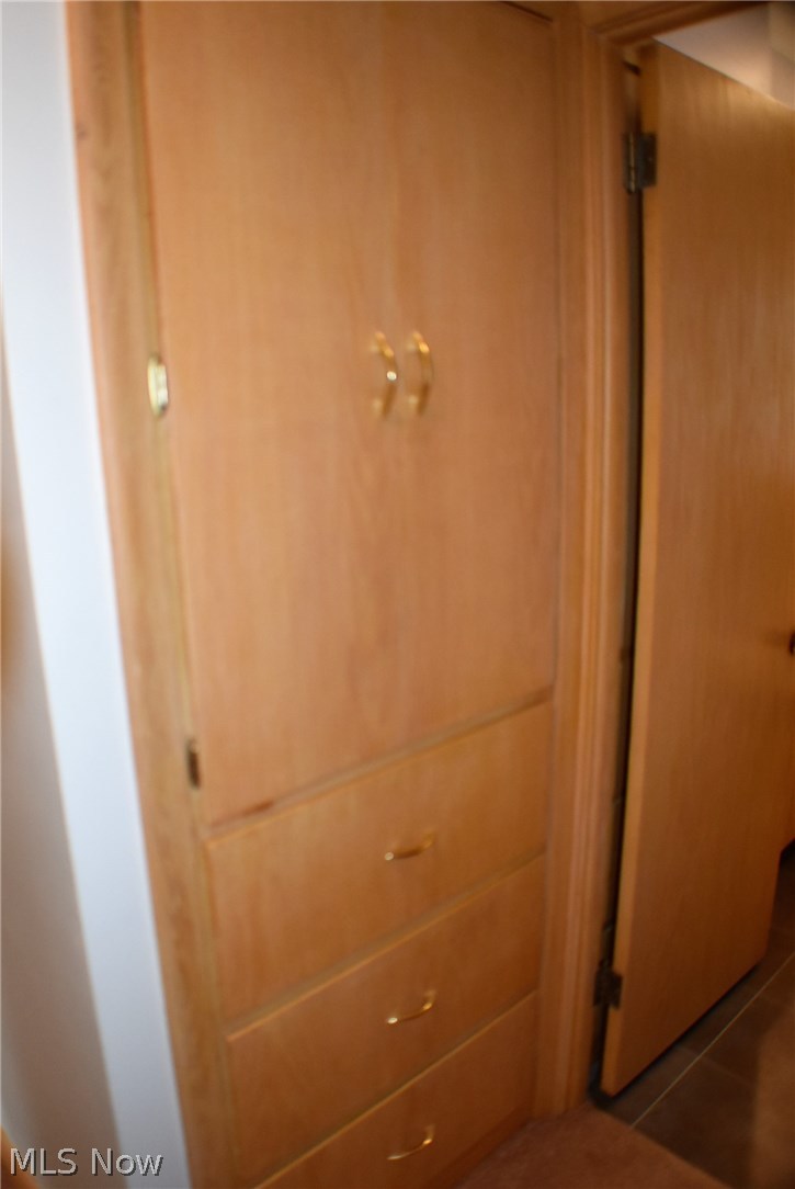 2155 Springfield Center Road Akron, OH 44312 - Photo 19 of 35 Built in linen closet storage