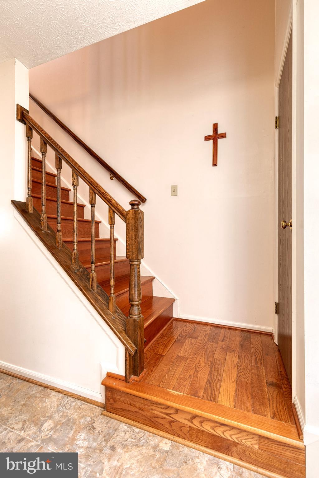 8676 Mission Road Jessup, MD 20794 - Photo 14 of 32 Hard wood stairs leading upstairs