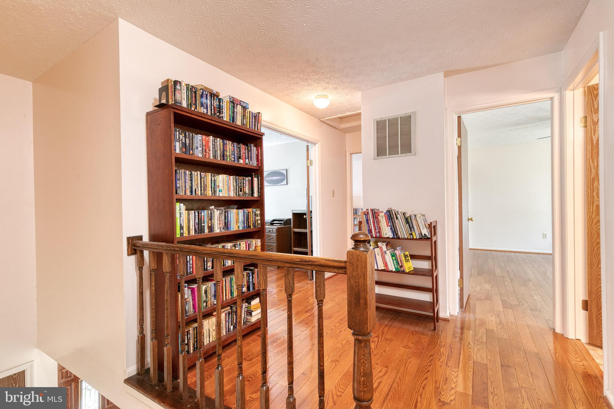 8676 Mission Road Jessup, MD 20794 - Photo 15 of 32 Upstairs hall way Looking in to Bedroom 4/office