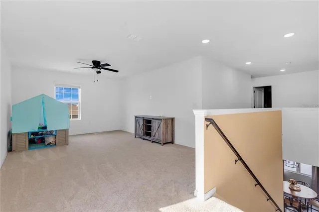 a view of a livingroom with furniture