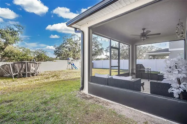a view of a swimming pool with a porch
