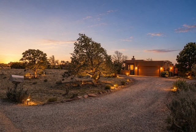 6 Palacio Road Santa Fe, NM 87508 - Photo 1 of 19 Welcome to 6 Palacio (Lighting created by ai)