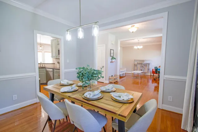 a living room with furniture potted plant and a fireplace