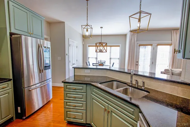 a bedroom with a bed and a potted plant