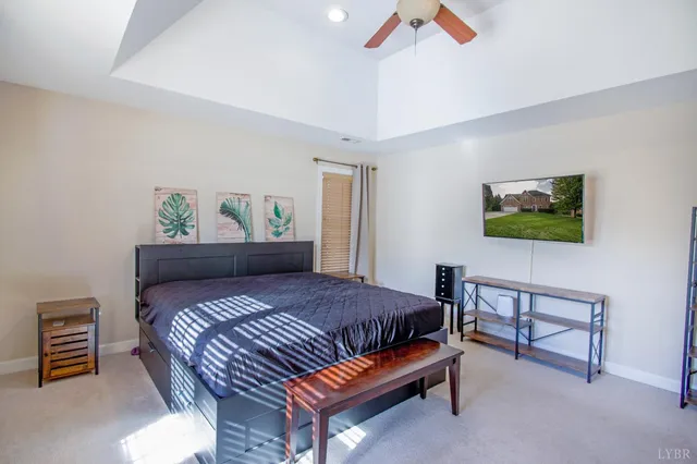 a bathroom with shower and mirror