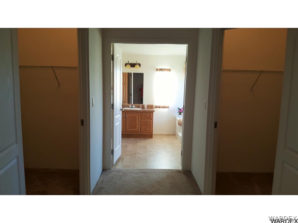 5341 North Laguna Road Golden Valley, AZ 86413 - Photo 15 of 31 His Her walk in closets